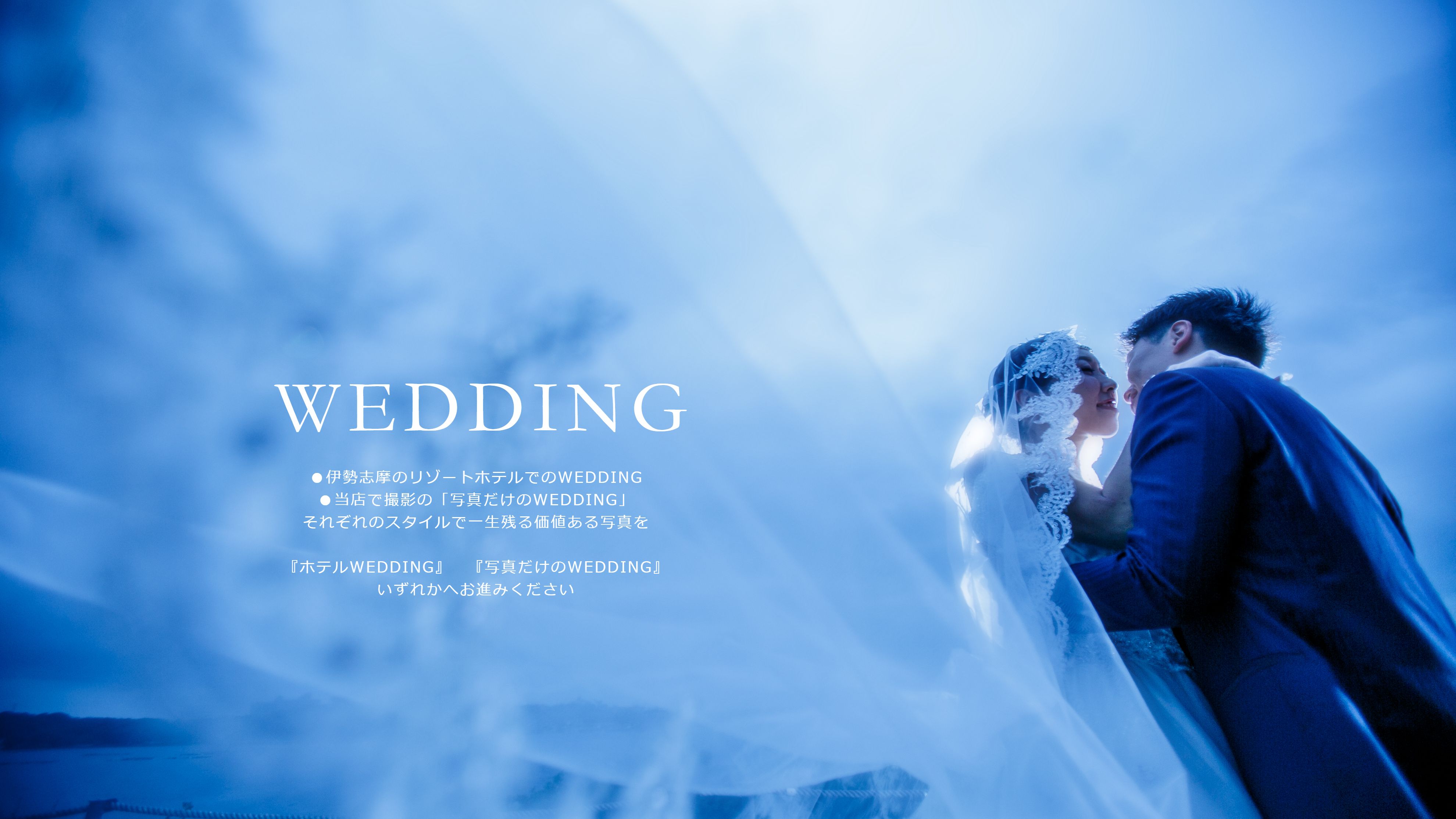 マリアベールの新婦と新郎が向かい合ってキスの一歩手前